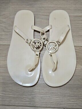 Michael Kors Cream Jelly Thong Sandals with Gold MK Logo